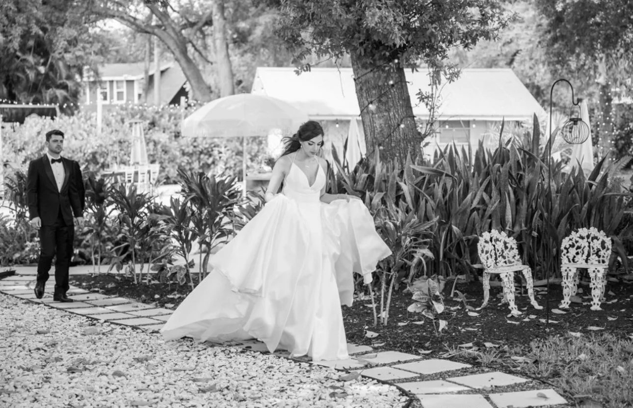 Bride and groom sharing an intimate moment in the garden