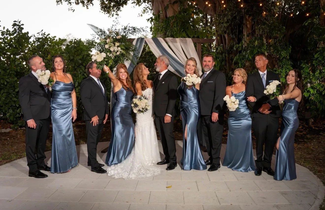 Wedding party group photo beneath the banyan tree at The Tree House